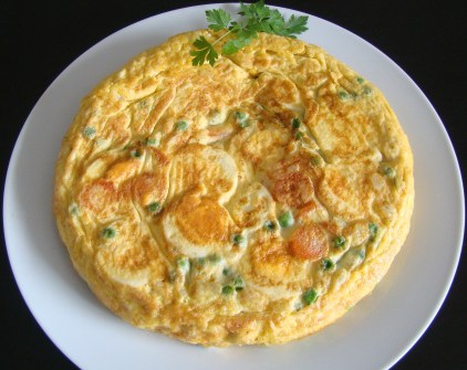 La imagen tiene un atributo ALT vacío; su nombre de archivo es tortilla-de-zanahoria-y-guisantes.jpg